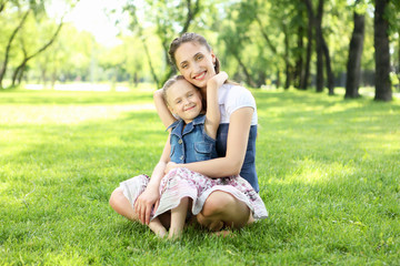 Fototapeta premium Mother with her daughter outside