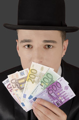 Gesicht mit Melone und Geld; Face with Melon Hat and Money