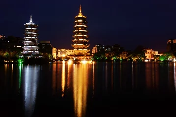 Foto op Plexiglas Double wooden towers in guilin of china nightscape © cityanimal