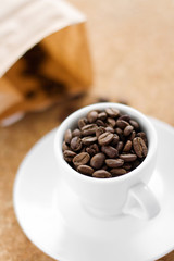 Coffee cup with coffee beans