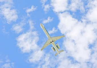 The plane in the sky close up
