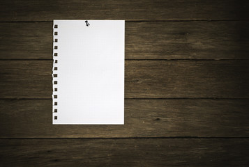 blank paper on wood background