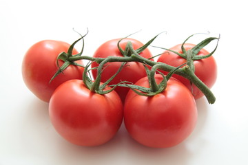 five red tomatoes