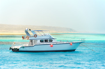 One white yacht in red sea