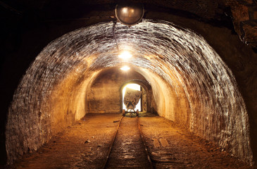 Underground train carts in gold, silver and copper mine.