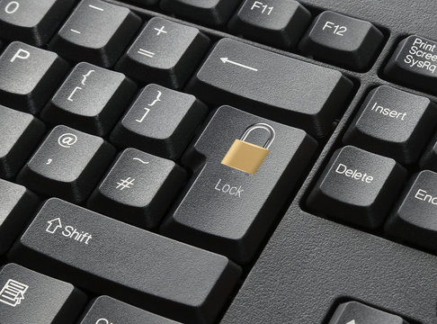 A Black Keyboard With Lock Key