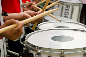 Drummans playing in the band