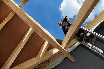 carpenters constructing a dormer