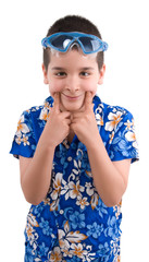 Cool boy wearing hawaiian shirt smiling.