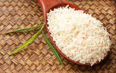 Raw rice with bamboo leaf