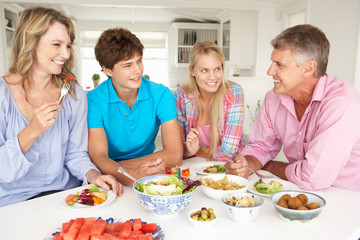 Family enjoying meal at home