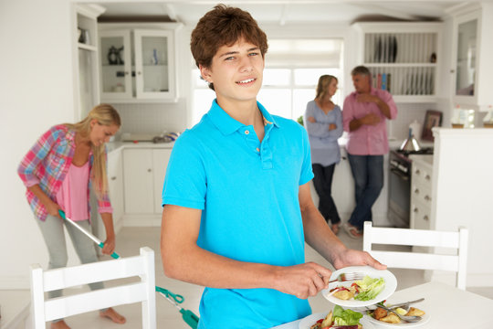 Teenagers Helping With Housework