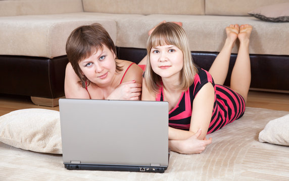 girls using laptop
