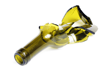 broken green wine bottle isolated on the white background