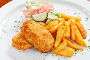 chicken cutlet with fried potatoes