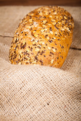 Composition of fresh bread on wood