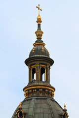 Fototapeta na wymiar Golden Cross on top of Church Dome