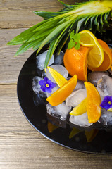 Zitrusfrüchte und Eis