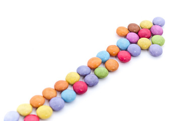 Schokolinsenpfeil zeigt nach oben