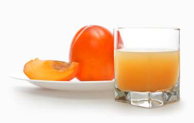 fruit persimmons and glass of juice
