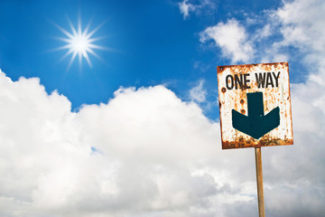 Grunge label sign against sunrise blue sky