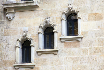 Fototapeta na wymiar windows in a old stone wall