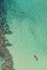 Stand Up Paddles surfer