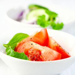 Chopped tomatoes and basil for salad