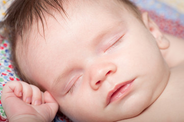 Closeup portrait of sleeping baby boy