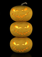 Image sinister pumpkins for Halloween on a black background