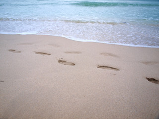 south beach footprints in sand