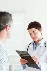 Close up of a Female Doctor talking to a patient