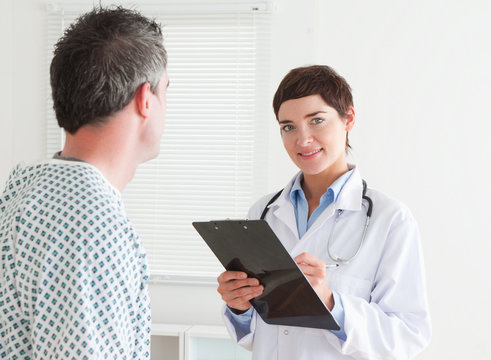 Female Doctor talking to a patient