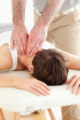 Fototapeta na wymiar Woman getting a neck-massage