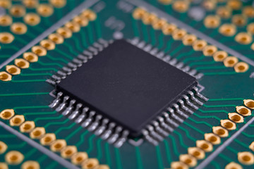 High-tech chip on the green circuit board