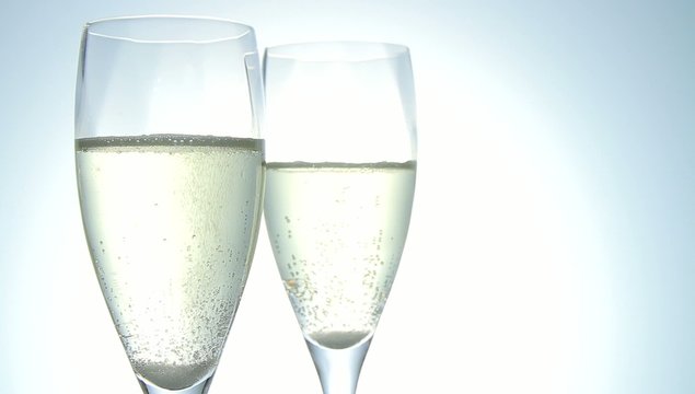 two glasses of bubbling champagne