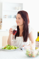 Close up of a beautiful women drinking wine