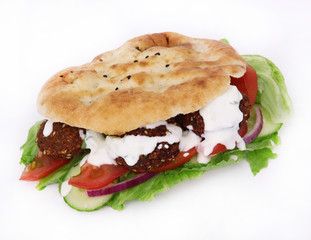 Falafel sandwich isolated on white