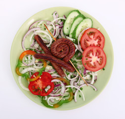 Delicious sausages with vegetable
