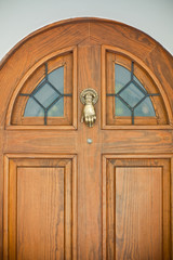 Wooden Door With Interesting Knocker