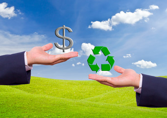 business man hand exchange dollar sign and recycle icon
