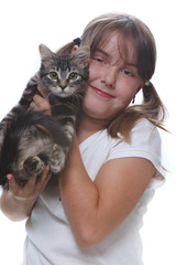 Child Holding a Kitten on White