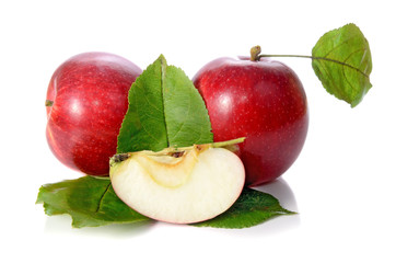Fototapeta na wymiar red apple with green leaves