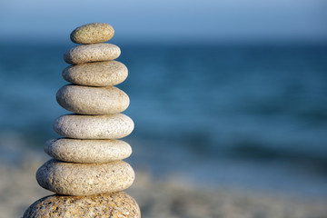 Stone balance pebble stones on beach