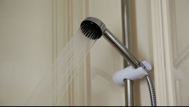 Water flowing from a shower head.