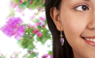 Smiling Beautiful Girl With Flowers Background