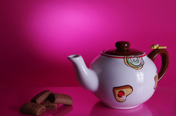 Teapot and biscuits