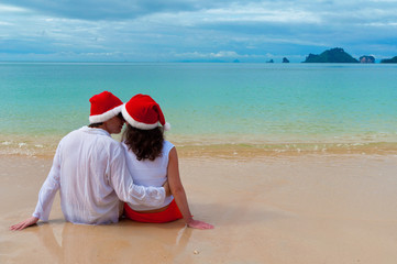 Christmas tropical vacation. Romantic couple on beach