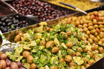 olives, pickles and salads on market stand