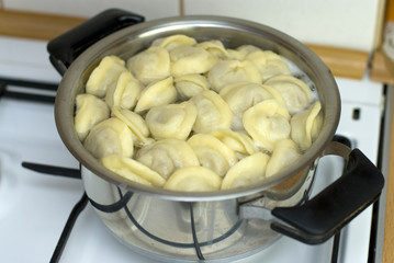 Russian pelmeni meal cooked in a pan